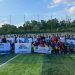 Peserta turnamen IGORNAS Provinsi Jambi berfoto bersama usai pembukaan pertandingan antar guru olahraga se-Provinsi Jambi di Lapangan Jambi Mini Soccer, Sabtu (21/6/2025). (Dok. Nahar)