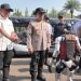 Robot Humanoid beratribut Polri berinteraksi dengan jajaran kepolisian dalam gladi kotor Hari Bhayangkara ke-79 di Monas, Jakarta, Selasa (24/6/2025). (Dok. TBnews)