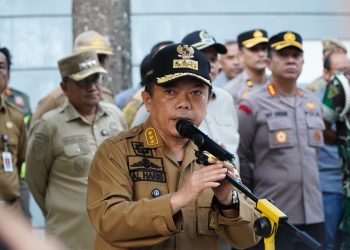 Kapolresta Jambi Kombes Pol Boy Sutan Binanga Siregar saat mengikuti apel penertiban bangunan liar di kawasan Pasar Rakyat Talang Banjar, Kota Jambi, Selasa (10/6/2025).(Dok. Stepanus)