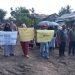Warga RT 03 Aur Kenali melakukan aksi damai menolak pembangunan stockpile batu bara milik PT SAS yang dinilai mengancam lingkungan dan melanggar zonasi permukiman, Minggu (6/7/2025). (Dok. Daus)