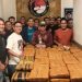 Tim Satresnarkoba Polresta Jambi bersama Kapolresta Kombes Pol Boy Sutan Binaga Siregar berfoto dengan barang bukti ganja seberat 200 kilogram hasil pengungkapan kasus narkotika di kawasan Simpang Rimbo, Kota Jambi, Minggu (13/7/2025). (Dok. Humas)