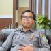Kepala DPMPTSP Kota Jambi, Yon Heri, memberikan keterangan kepada awak media terkait dituamh kerjanya,, Senin (14/7/2025). (Dok. Stepanus)