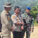 Petugas gabungan dari Polres Bungo, TNI, Satpol PP, serta instansi pemerintah daerah mengikuti apel kesiapan operasi penindakan PETI di Lapangan Eks MTQ Baru, Desa Sungai Mengkuang, Kecamatan Rimbo Tengah, Kabupaten Bungo, Kamis (17/7/2025). (Dok. Humas)