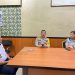 Kadishub Provinsi Jambi Drs. H. John Eka Powa (kiri) bersama Kepala Kantor Jasa Raharja Wilayah Jambi Ni Made Ayu Mulidyawati saat koordinasi lintas sektor di Kantor Ditlantas Polda Jambi, Senin (21/7/2025), (Dok, Yola)