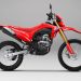 Tampilan baru Honda CRF 150L 2025 dengan warna Extreme Red yang diperkenalkan dalam ajang GIIAS 2025. Motor ini hadir dengan desain grafis baru dan fitur unggulan untuk menjelajah segala medan. (Dok, Sinsen)