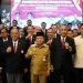 Gubernur Jambi Al Haris bersama Ketua KONI Provinsi Jambi AKBP Mat Sanusi, Ketua Umum KONI Pusat, dan jajaran pengurus KONI Provinsi Jambi masa bakti 2025–2029 berfoto bersama usai pelantikan di Rumah Dinas Gubernur Jambi, Senin (11/8/2025). (Dok. Yola)