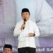 Gubernur Jambi Al Haris menyampaikan sambutan dalam peringatan Maulid Nabi Muhammad SAW di Ponpes Kumpeh Daaru At-Tauhid, Muaro Jambi, Sabtu (6/9/2025). (Dok. Daus)