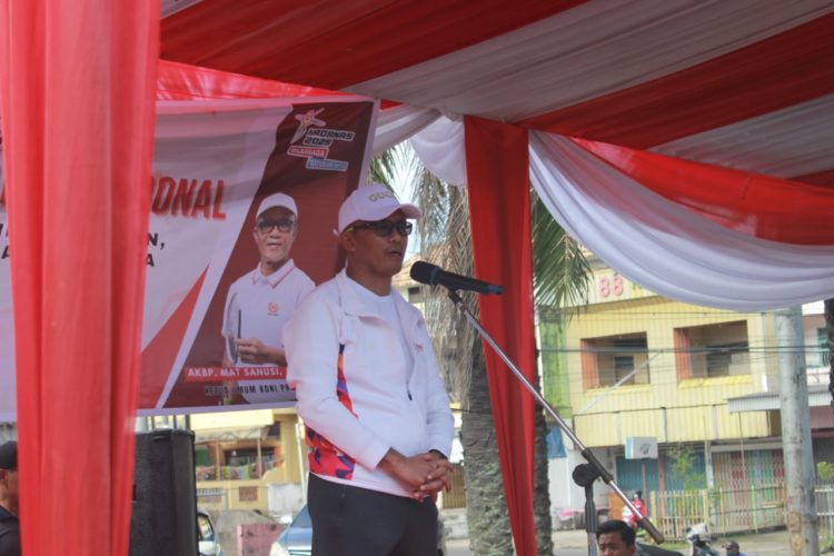 Ketua Umum KONI Provinsi Jambi, AKBP Mat Sanusi, memberikan sambutan pada peringatan Hari Olahraga Nasional (Haornas) ke-42 di pelataran KONI Jambi, Jumat (12/9/2025). (Dok. Stepanus)