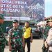 Kapolresta Jambi Kombes Pol Boy Sutan Binanga Siregar berbincang dengan Danrem 042/Gapu saat menghadiri kegiatan Bakti Teritorial Prima dalam rangka HUT ke-80 TNI di Pasar Angso Duo, Kota Jambi, Jumat (19/9/2025). (Dok. Nahar)