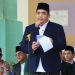 Bupati Bintan Roby Kurniawan membacakan amanat Menteri Agama RI Prof. Dr. KH. Nasaruddin Umar, MA saat bertindak sebagai inspektur upacara peringatan Hari Santri Nasional (HSN) 2025 tingkat Kabupaten Bintan di halaman Rektorat STAIN Sultan Abdurrahman Kepri, Rabu (22/10/2025) (Dok Ikram)