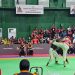 Atlet Tarung Derajat asal Jambi, Gilang Despriyanto (celana putih, pelindung hitam), saat melancarkan serangan terhadap lawannya dari Banten pada babak semifinal kelas 75,1–80 kg putra di GOR Djarum, Kudus, Jawa Tengah, Rabu (15/10/2025). (Dok. Koni Jambi)