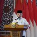 Gubernur Jambi, Al Haris, menyampaikan arahan dalam Rapat Konsolidasi Gerakan Orang Tua Cegah Stunting (Genting) di Auditorium Rumah Dinas Gubernur Jambi, Jumat (17/10/2025). (Dok. Erit - Kominfo)