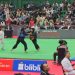 Pesilat putri Jambi, Andhini Ayu Puspita Dewi (sabuk biru), bertarung melawan Indri Bulqis dari NTB pada babak perempat final cabang pencak silat PON Bela Diri di GOR Djarum, Kudus, Minggu (19/10/2025). (Dok. Koni Jambi)