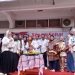 Romi Harianto poto bersama pengurus DPW PSI Jambi usai memotong tumpeng sebagai simbol rasa syukur atas usia ke-11 partai. (Dok. Stepanus)