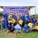 Anak-anak dan remaja Kampung Pulau Pandan mengikuti Lomba Layang-layang Ceria yang digelar Ditpolairud Polda Jambi dalam rangka menyambut HUT ke-75 Polairud, Jumat (22/11/2025). (Dok. Nahar)