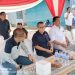 Wakil Ketua KONI Provinsi Jambi, Adri dan panitia Kejurda Renang 2025 menghadiri pembukaan kejuaraan di Kolam Renang Raja Kota Baru, Kota Jambi, Senin (24/11/2025). (Dok. Stepanus)