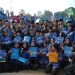 Ribuan PPPK paruh waktu foto bersama seusai menerima SK pengangkatan yang diserahkan Gubernur Jambi Al Haris pada Upacara HUT Ke-54 KORPRI di Lapangan Kantor Gubernur Jambi, Senin (1/12/2025). (Dok. Stepanus)