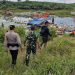 Tim gabungan Pemkab Merangin, TNI, dan Polri meninjau lokasi penertiban aktivitas PETI di kawasan Objek Wisata Dam Betuk, Rabu (3/12/2025). (Dok. Humas)