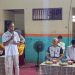 Ketua Harian KONI Provinsi Jambi, Hasan Mabruri, memberikan sambutan saat membuka Kejurprov Gulat Jambi 2025 yang berlangsung di Gedung Gulat Jambi, Jumat (5/12/2025). (Dok, Daus)