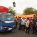 Pejabat Pemprov Jambi, TNI, Polri, dan BPBD melepas keberangkatan truk bantuan kemanusiaan menuju Aceh, Sumatera Utara, dan Sumatera Barat, di Posko Udara BPBD Ex VIP Bandara Lama, Jambi, Kamis (11/12/2025). (Dok. Nahar)