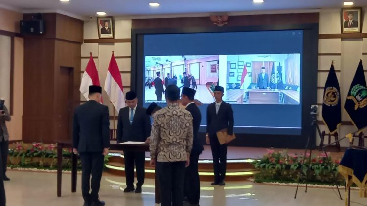 Prosesi pelantikan Kepala Lapas Kelas IIA Jambi di Aula Kanwil Kemenkumham Jambi, disaksikan para pejabat dan tamu undangan. (Dok. Daus)
