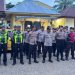 Personel Polres Muaro Jambi bersiaga melakukan pengamanan pembukaan Turnamen Sepak Bola Gubernur Cup Provinsi Jambi Tahun 2026 di Stadion Swarnabhumi, Kecamatan Jaluko, Kabupaten Muaro Jambi, Rabu (14/1/2026). (nahar)