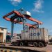 Aktivitas bongkar muat dan arus kendaraan truk di Terminal Petikemas Pelabuhan Talang Duku, Muaro Jambi, yang kini telah menerapkan sistem Single Truck Identification Data (STID) terintegrasi dengan Inaportnet. (Dok. Humas)