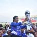 Pemain FC Koja mengangkat trofi juara Gubernur Cup 2026 usai menaklukkan tim Kabupaten Merangin melalui adu penalti pada laga final di Stadion Swarna Bhumi, Pijoan, Kabupaten Muaro Jambi, Minggu (25/1/2026). (Dok, Stepanus)