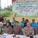 Jajaran Polresta Jambi bersama kelompok tani mengikuti kegiatan Panen Raya Jagung Serentak Kuartal IV Tahun 2025 secara daring di lahan Kelompok Tani Tunas Jaya, Kelurahan Paal Lima, Kecamatan Kota Baru, Kamis (8/1/2026). (Dok. Nahar)