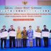 Penyerahan dana secara simbolis digelar oleh OJK selaku koordinator Satgas PASTI dan IASC di Jakarta, Rabu (21/1/2026). (Dok. Humas OJK)