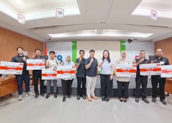 Manajemen PT Sinar Sentosa Primatama bersama perwakilan jaringan AHASS se-Provinsi Jambi usai kegiatan Meeting Jaringan AHASS dan penyerahan penghargaan kinerja tahun 2025 di Jambi, Selasa (20/1/2026). (Dok. Nahar)