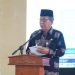 Wakil Gubernur Jambi, Abdullah Sani, menyampaikan sambutan saat menghadiri peringatan HUT ke-70 Desa Tangkit di Gedung Olahraga Desa Tangkit, Kabupaten Muaro Jambi, Kamis (12/2/2026). (Dok. Erit)
