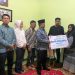 Wali Kota Jambi Maulana bersama jajaran Pemkot Jambi dan BPJS Ketenagakerjaan menyerahkan santunan Jaminan Kematian (JKM) sebesar Rp42 juta kepada ahli waris almarhum Adrizal, Ketua RT 34 Kelurahan Talang Banjar, Kecamatan Jambi Timur, Sabtu (31/1/2026). (Dok. Stepanus)