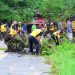 Personel Polda Jambi bersama Polres dan Polsek jajaran membersihkan fasilitas umum saat aksi korve massal serentak di Lapangan Eks Arena MTQ, Kota Jambi, Jumat (6/2/2026). (Dok. Nahar)