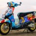 Yamaha Grand Filano Hybrid hasil modifikasi Blastoise tampil sporty dengan grafis khas Jepang terinspirasi helm Motegi, memadukan unsur estetika, detail presisi, dan performa untuk menonjolkan karakter skutik Classy yang adaptif. (Dok. Yamaha)