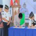 Pejabat LPKA Kelas II Muara Bulian dan Bapas Kelas I Jambi menandatangani dokumen kerja sama pembukaan Program Kolaborasi Pelatihan Barbershop di Muara Bulian, Kamis (12/2/2026). (Dok. Humas)