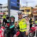 Personel Satlantas Polresta Jambi memberikan BBM gratis kepada pengemudi ojek online di sekitar SPBU KONI, Kota Jambi, Jumat (14/2/2026), (Dok. Nahar)