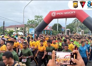 Personel Brimob Polda Bengkulu turut ikuti kegiatan Fun Run HUT Korem yang digelar di Kota Bengkulu, Sabtu (14/2/2026). (Dok/yola)