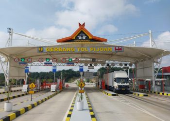 Kendaraan melintas di Gerbang Tol Pijoan (Dok. Humas HK)