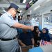 Direktur Jasa Raharja Muhammad Awaluddin menyapa penumpang saat pelepasan program Mudik Gratis BUMN 2026 di Stasiun Pasar Senen, Jakarta, Senin (16/3/2026). (Dok. Humas JR Jambi
