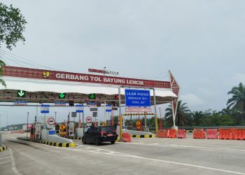 Kendaraan melintas di Gerbang Tol Bayung Lencir (Dok. Humas HK)