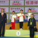 Atlet wushu Indonesia berpose di podium usai menerima medali pada Kejuaraan Dunia Wushu Junior 2026 di Tianjin (Dok. Humas)